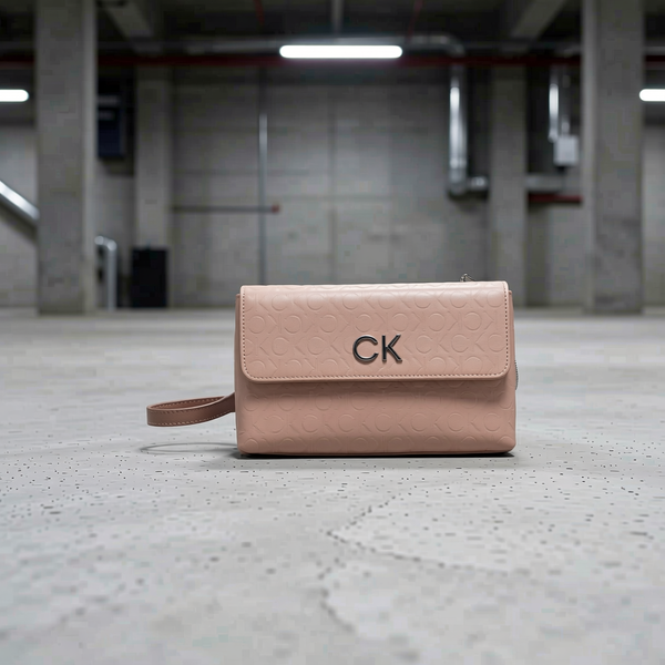 Calvin Klein - Minimalist Embossed Logo Crossbody Bag - Pink